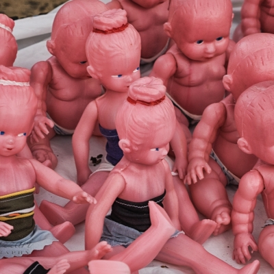 Something a bit weird about a stand full of half naked dolls